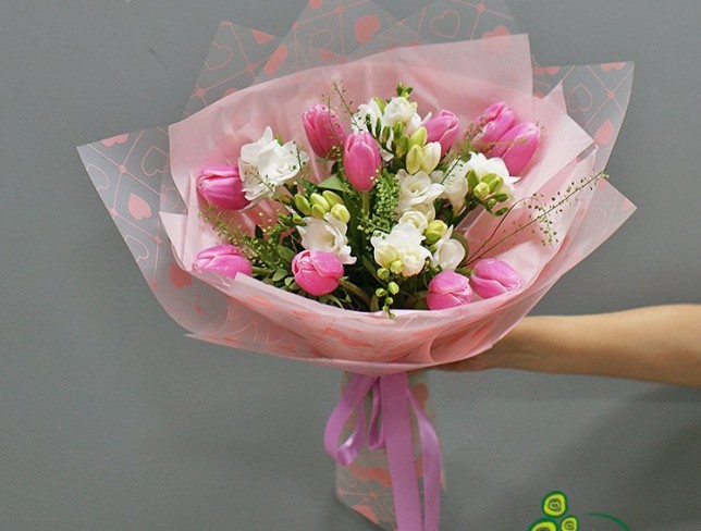 Bouquet with white freesias and pink tulips photo